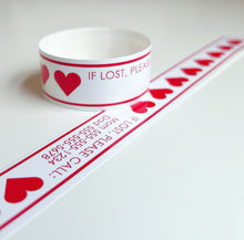 Load image into Gallery viewer, ID BANDS | VALENTINE HEARTS - Bushel & Peck Paper - set of 12 custom printed adustable vinyl travel bands for kids and adults